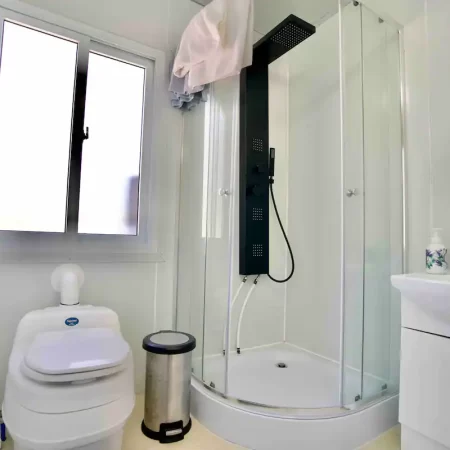 Eco-friendly bathroom essentials, ensuring comfort with a composting toilet.