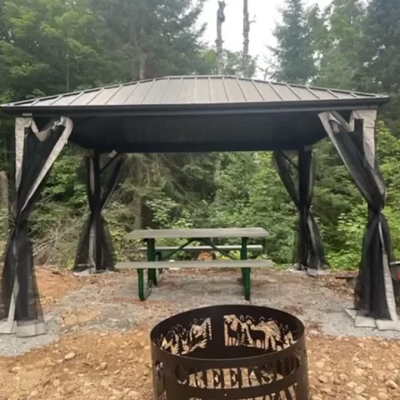 gazebo, fire pit and picnic table in muskoka